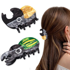 Heogacinlia rhinoceros beetle hairpin in yellow securing casual half-up style