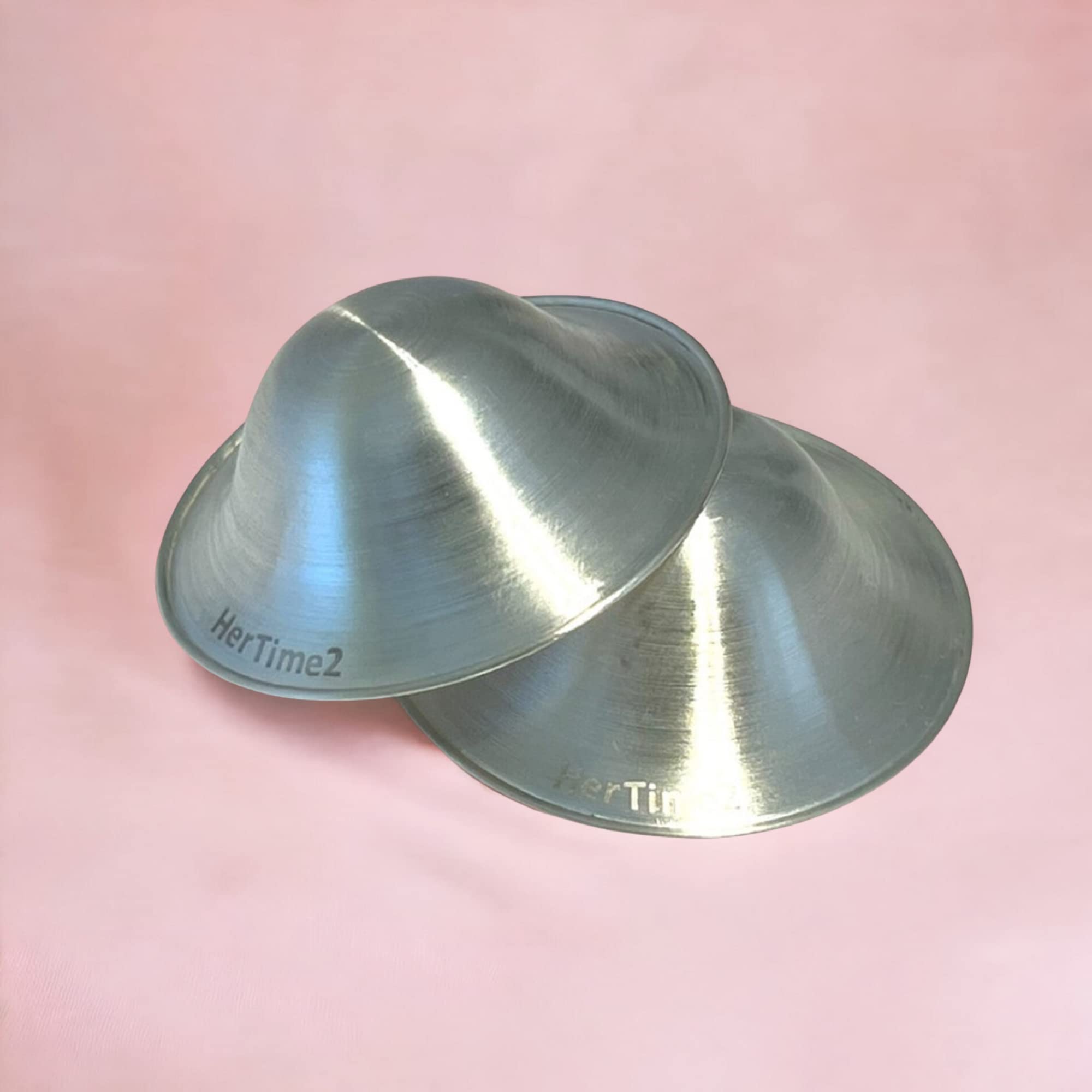 HerTime2 Silver Nursing Cups with ergonomic, rounded shape