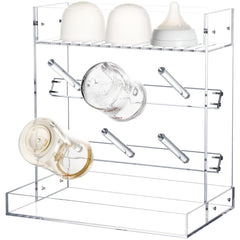 Heyrelda vertical bottle drying rack keeps bottles organized after washing.