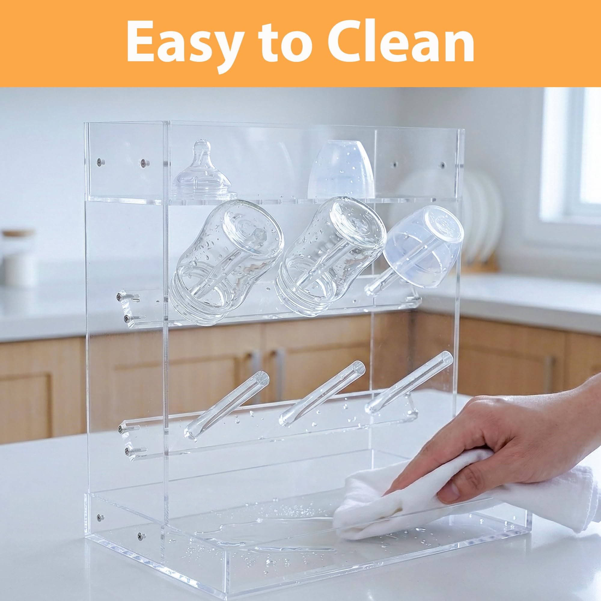 Heyrelda bottle rack includes a drip tray for nipples and pacifiers.
