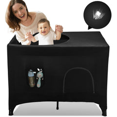 Hiaksedt Pack N Play blackout cover over a travel crib, creating a darkened sleep space