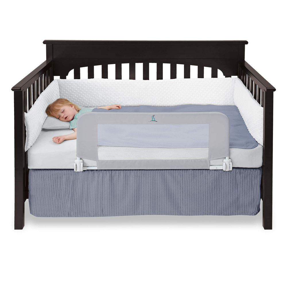 hiccapop crib rail anchors securely to bed frame for stable toddler protection.
