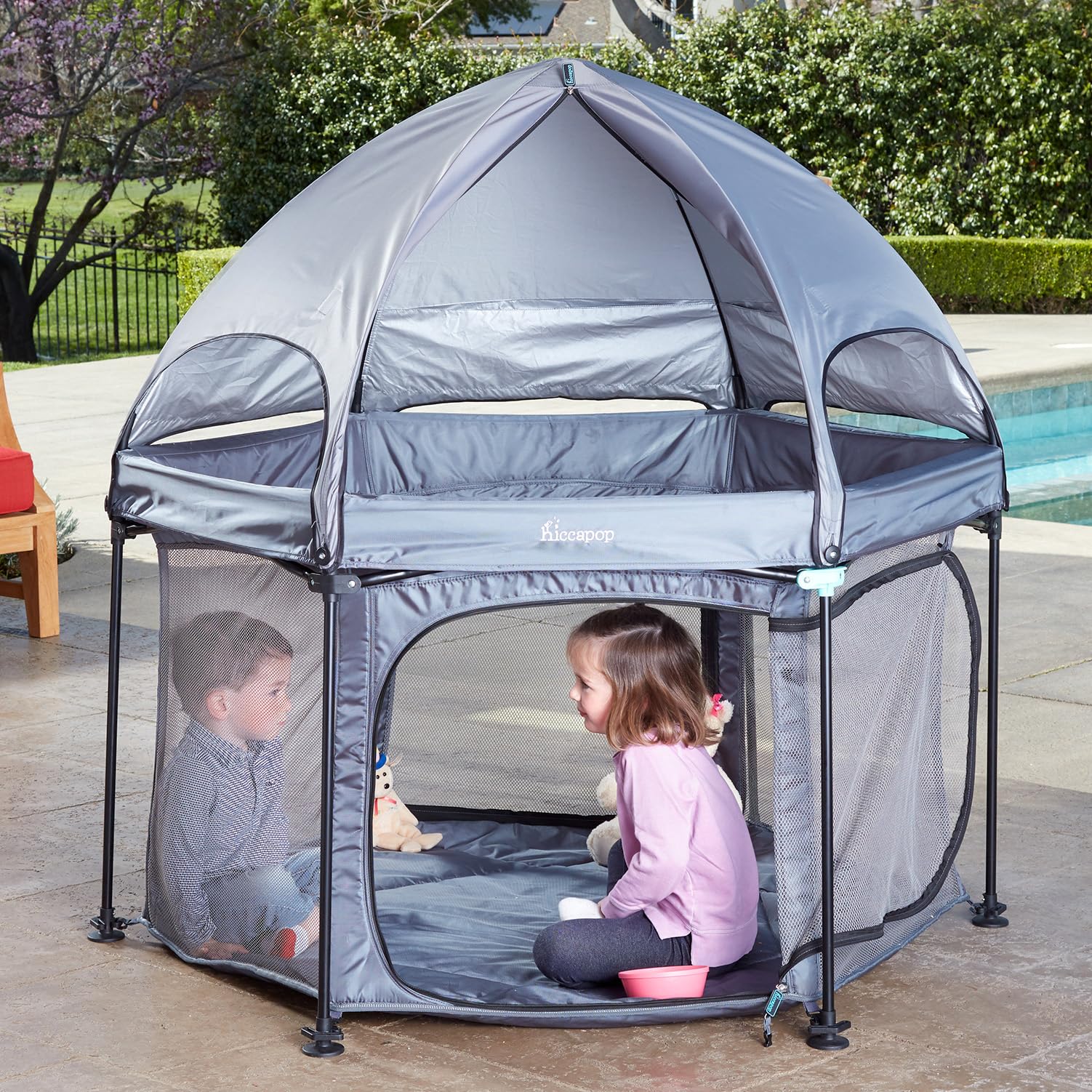 hiccapop PlayPod 53-inch outdoor playpen with canopy providing shade and space