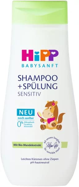 HiPP Baby Shampoo almond oil foam demonstrates a mild lather for sensitive scalps.