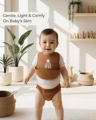 Hippypotamus bib being washed highlighting dishwasher-safe cleaning