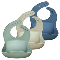 Hippypotamus silicone baby bib on a baby catching spills during mealtime