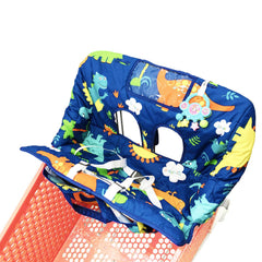HIVVI child seated in cart with navy dinosaur cover