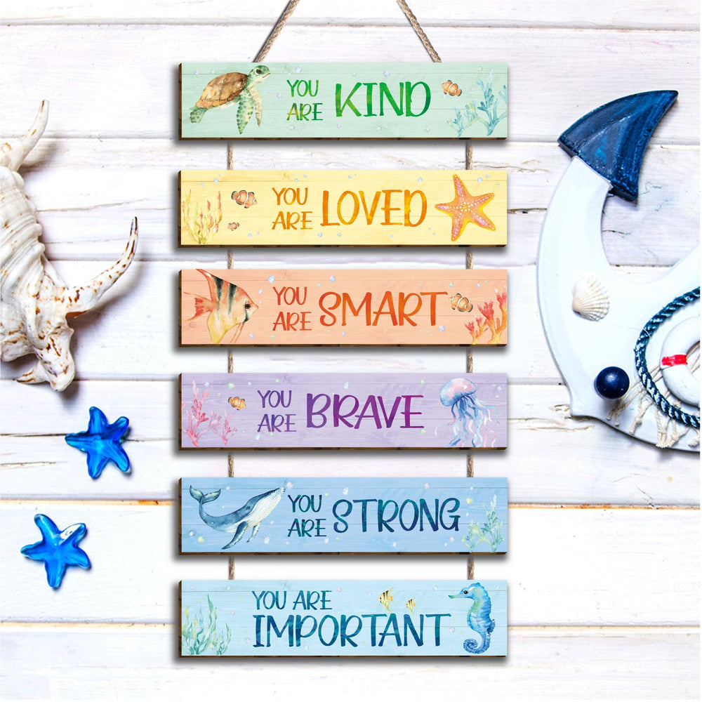 HIWERAN ocean wall art collection enhances nursery or toddler room aesthetics.