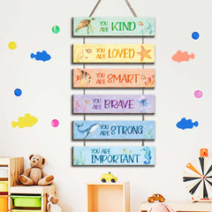 HIWERAN wooden wall signs for kids room create a cohesive ocean theme.