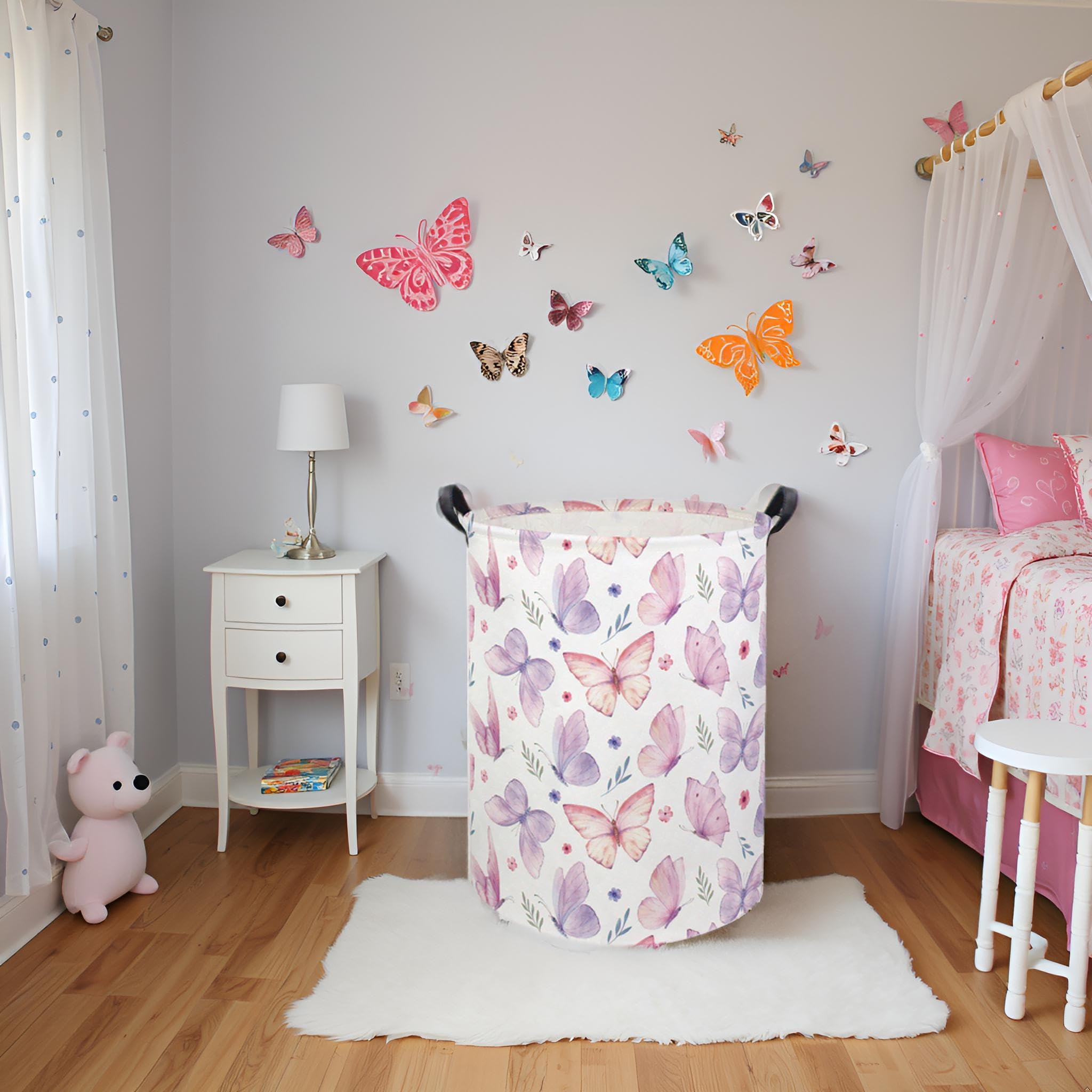 HIYAGON butterfly baby laundry basket front view highlighting sturdy handles for easy transport.