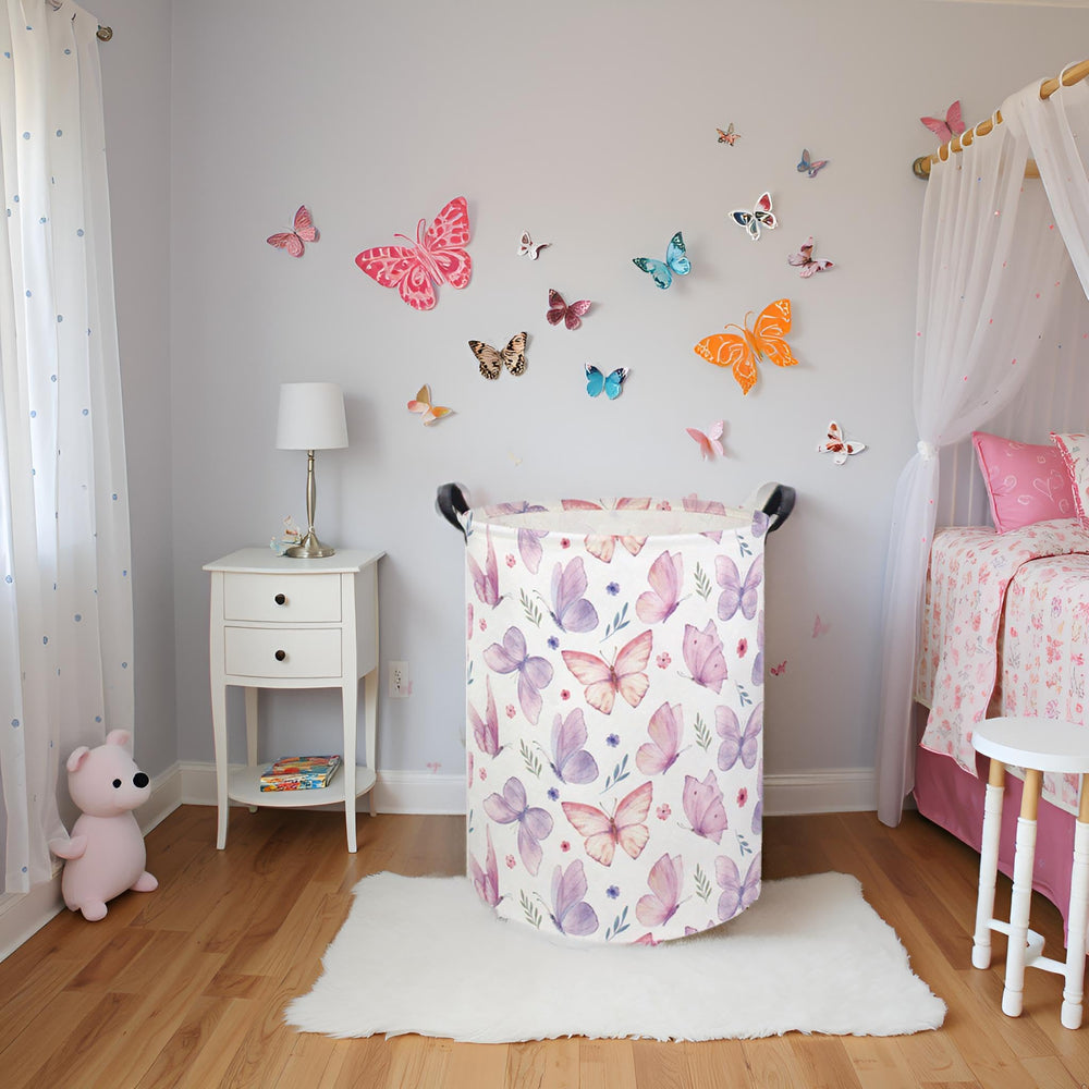 HIYAGON butterfly baby laundry basket front view highlighting sturdy handles for easy transport.