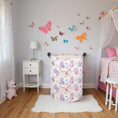 HIYAGON butterfly baby laundry basket front view highlighting sturdy handles for easy transport.