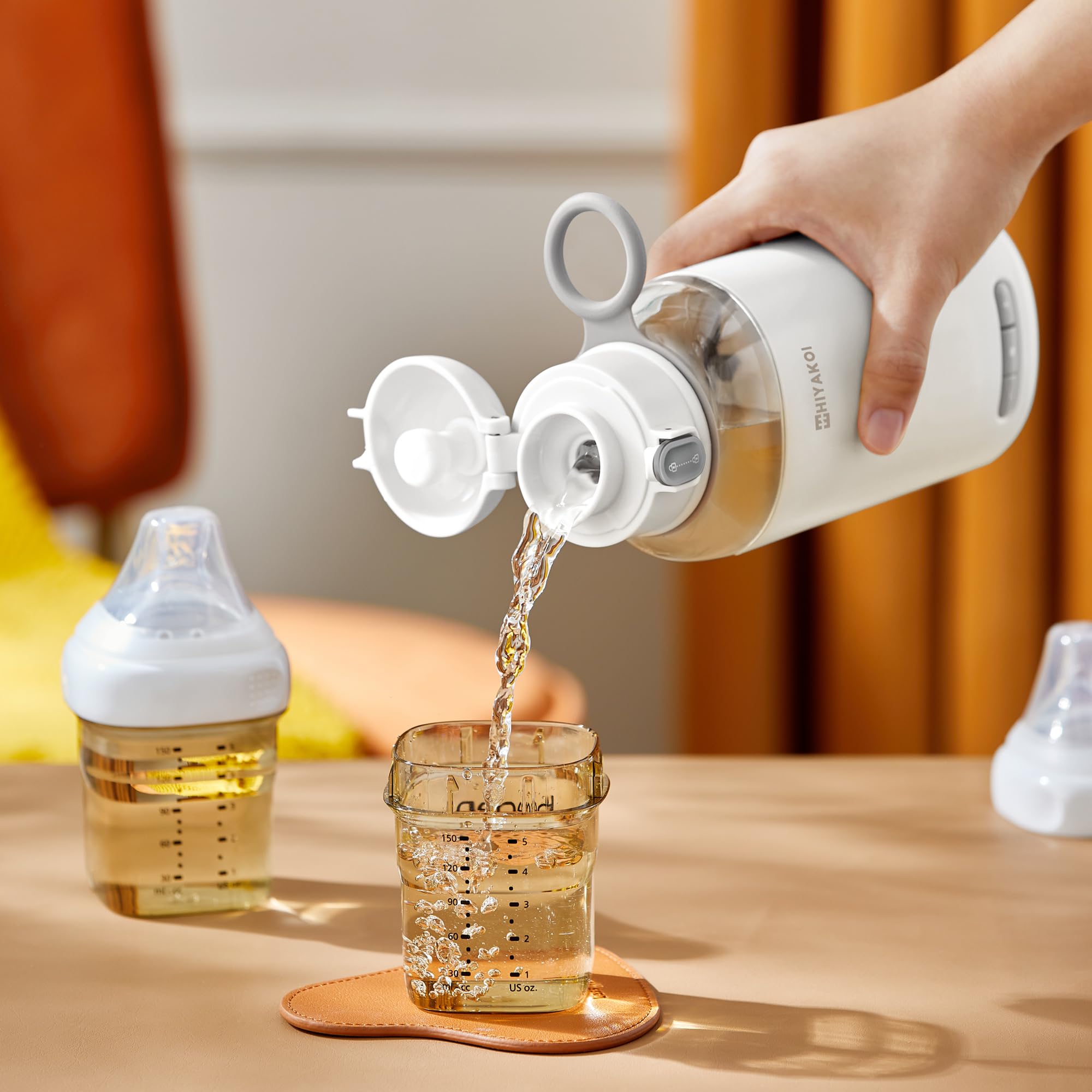 HIYAKOI compact travel warmer blends speed and style for parents.