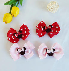 Hjiaruiky closeup of mouse ears bow shows secure grip on hair.