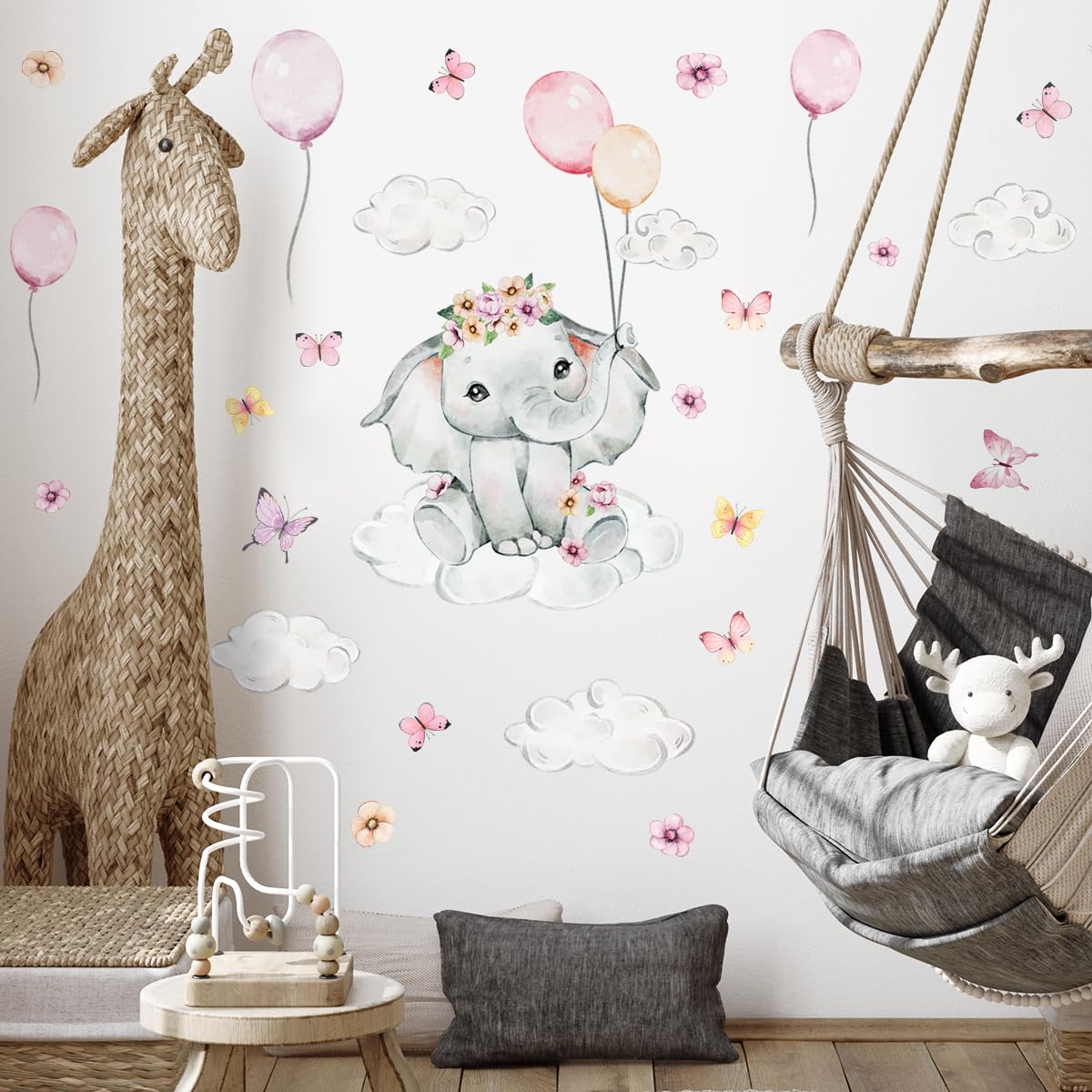 HJKlove elephant nursery wall art helps define a cozy, imaginative play area.