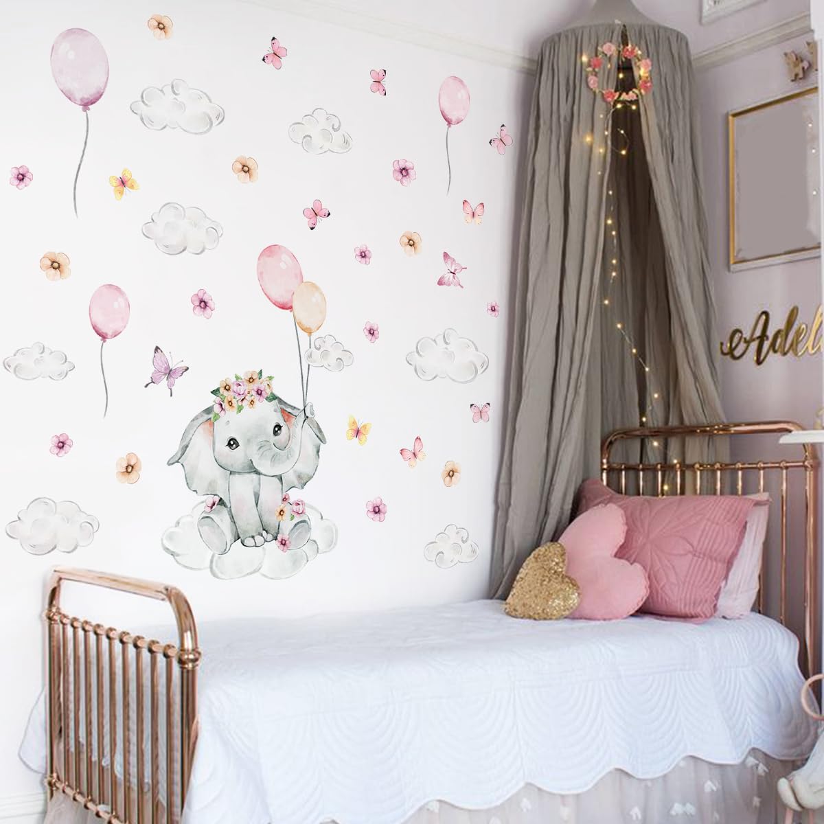 HJKlove watercolor white cloud wall sticker creates soft skies above your little one's crib.