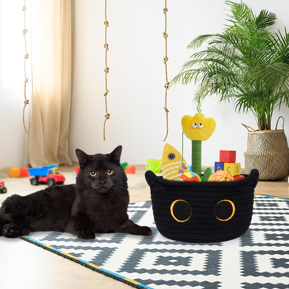 Hkojewp Nursery decor basket complements toys and blankets with cat theme.