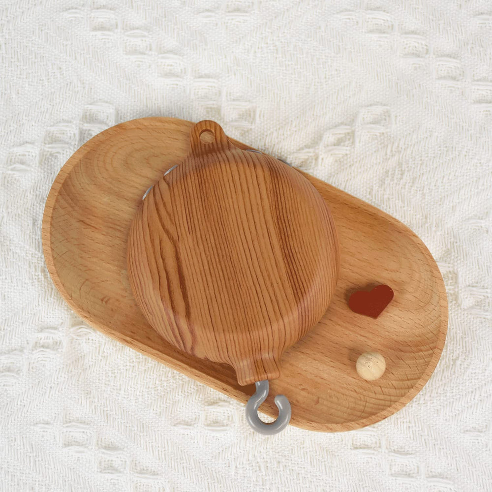 HLEEDUO music box with wood-grain finish adds warm nursery decor