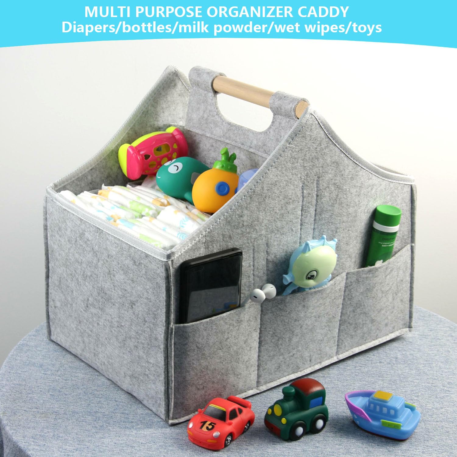 Solid wood handle on HMOSSVK diaper caddy for comfortable carrying at home or travel