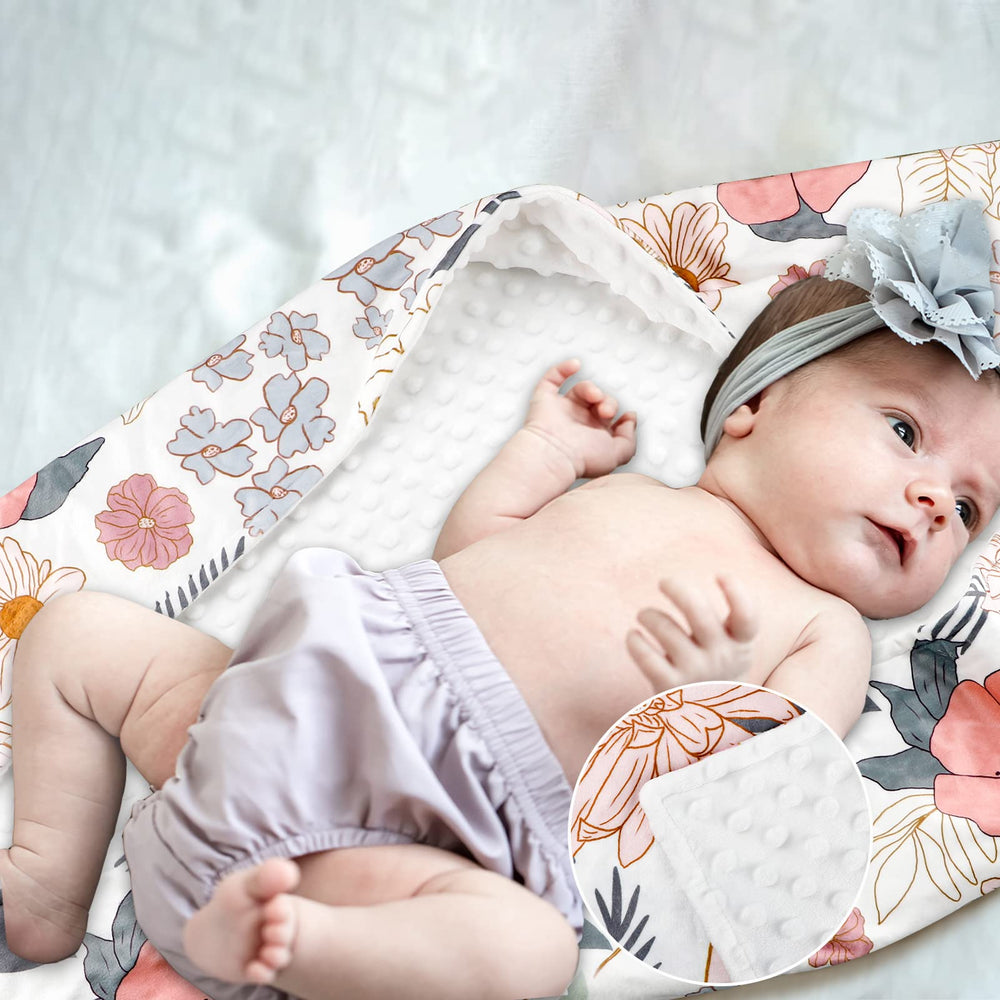 HNHUAMING baby blanket with dotted backing adds gentle texture for nap time.