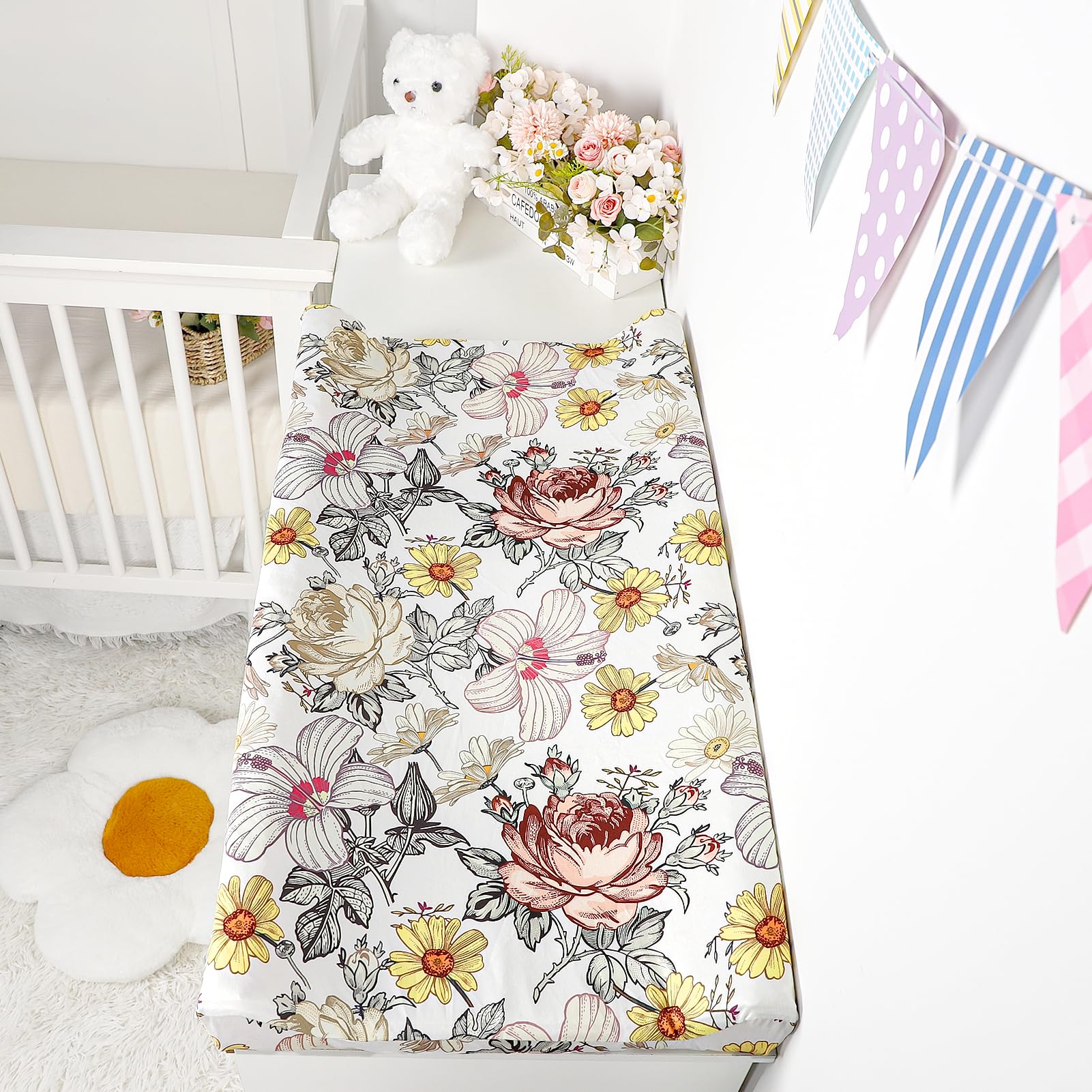 HNHUAMING floral design covers a standard pad and coordinates with various nursery styles.