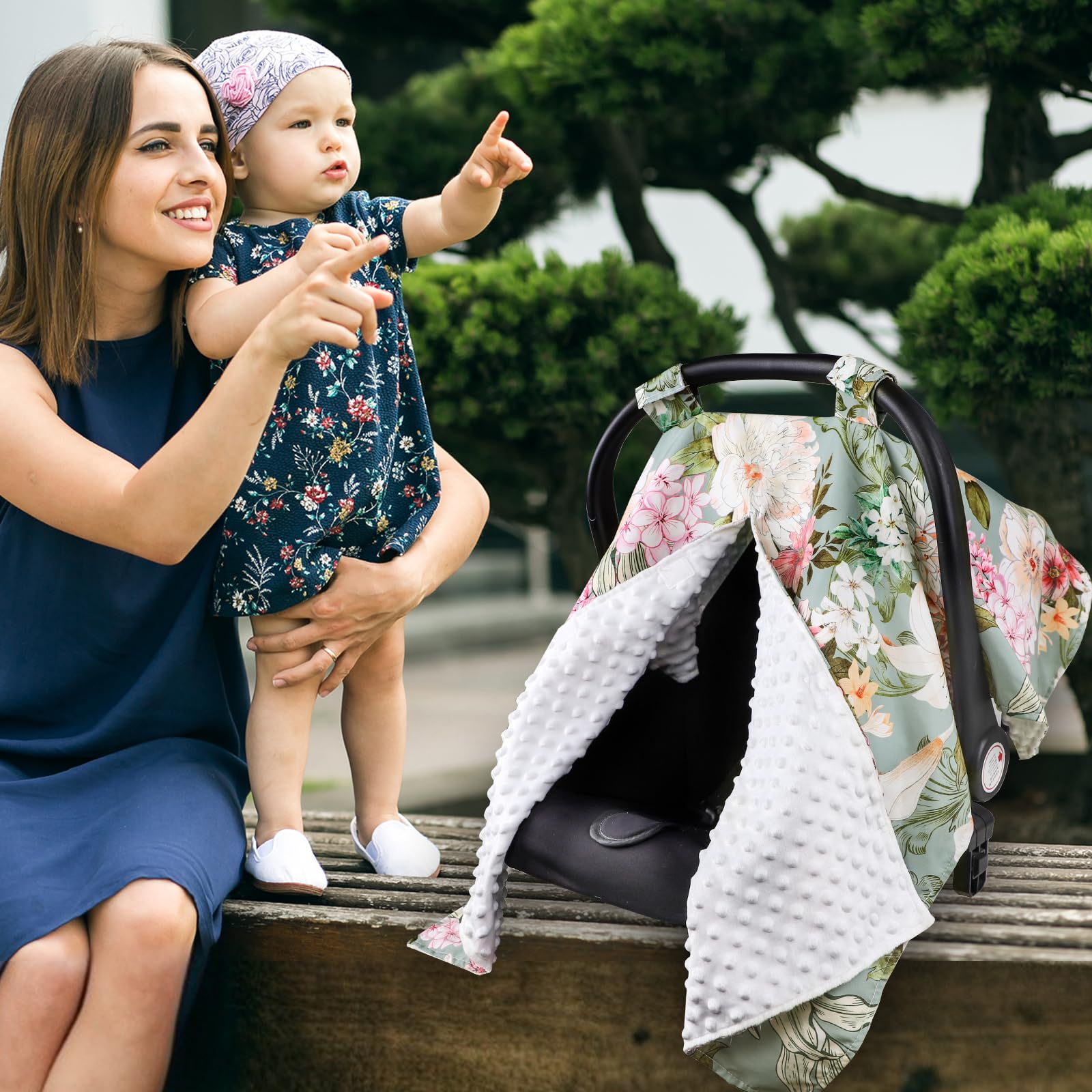 HNHUAMING foldable travel cover fits easily in a diaper bag.
