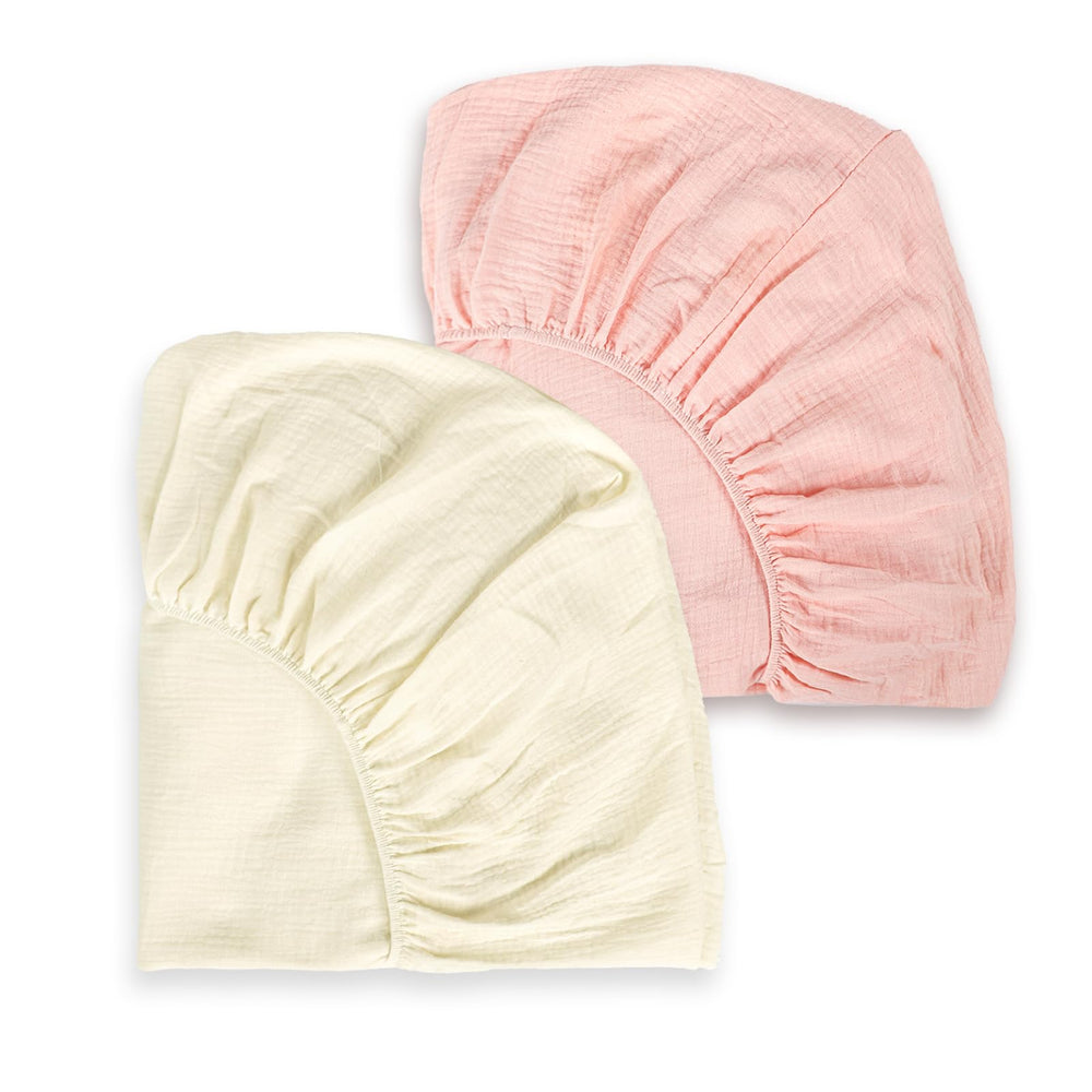 HNHUAMING pink muslin crib sheet on mattress offers breathable comfort for naps.