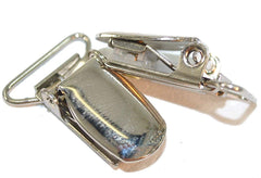 Hold-Up Suspender Co. center-pin closeup demonstrates secure locking for thick fabrics.