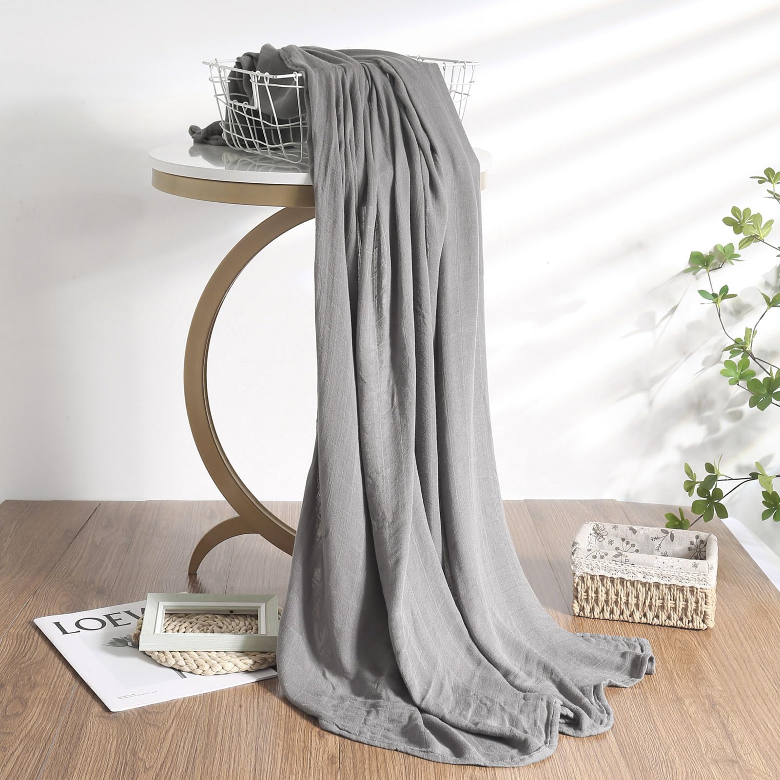 Hollyoo baby wrapped snugly in large 47x47 swaddle.
