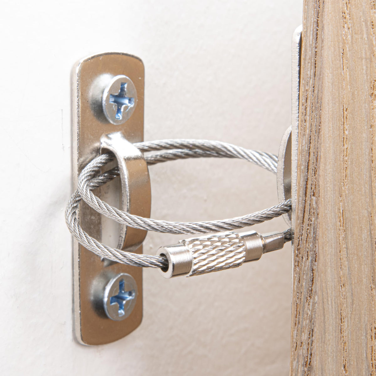 HomeBrella 12-pack furniture anchors pack-shot stabilizing furniture to prevent tip-overs.