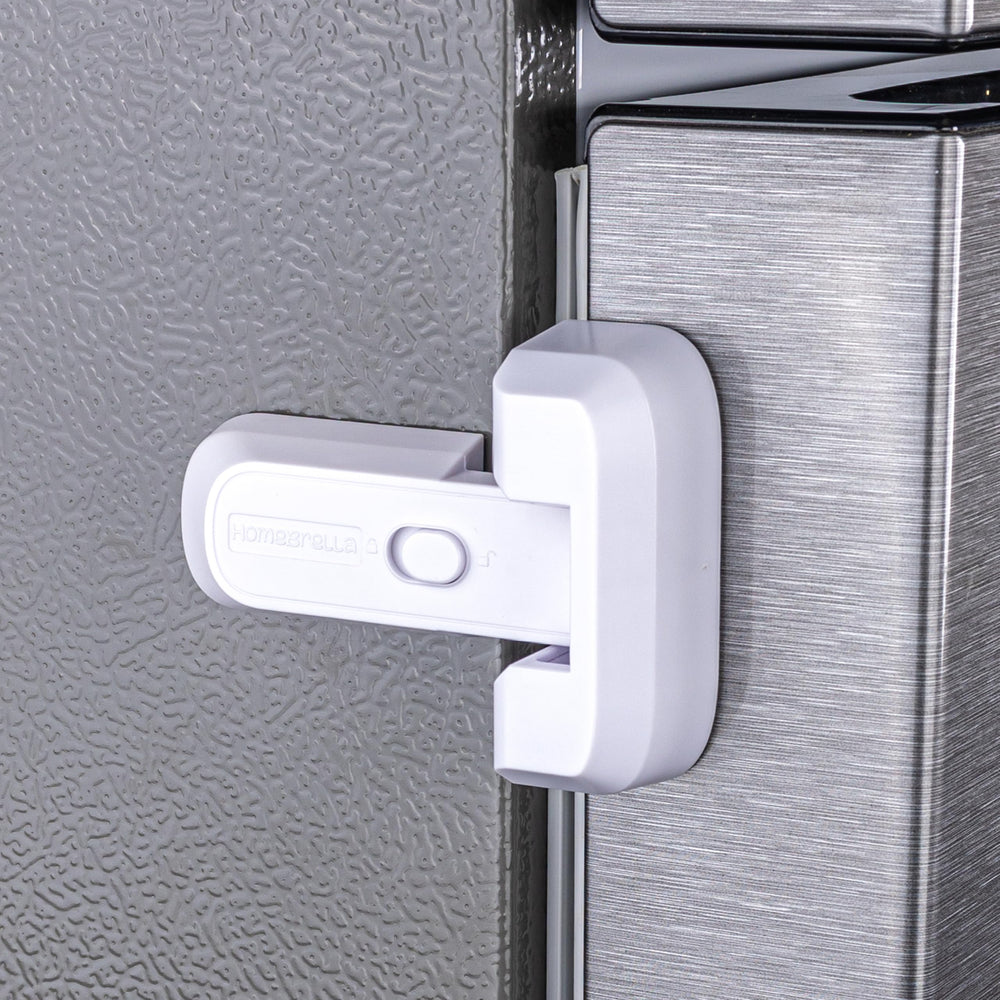 HomeBrella fridge lock with adhesive pad securing doors for child safety.