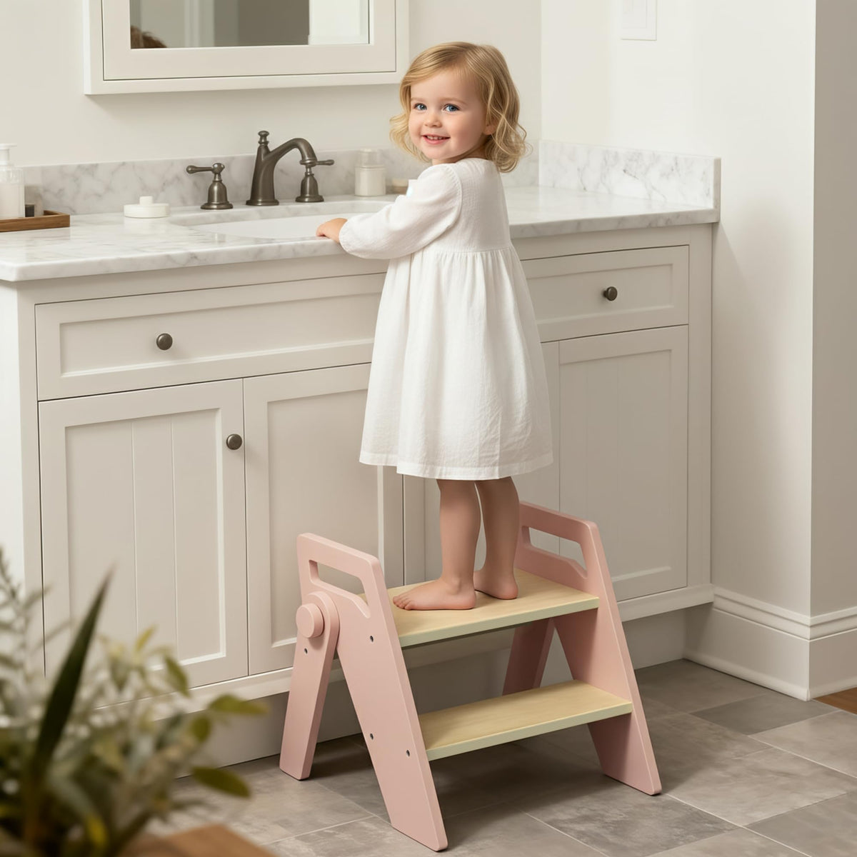 HOMEKOL pink wooden toddler stool front view provides sturdy handwashing support.