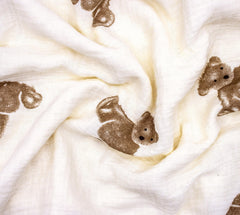 HomeyHues double-layer cotton blanket texture close-up highlights breathable warmth.