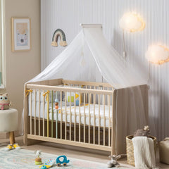 HOMREALM transparent silicone corner guard blending with furniture while softening impact.