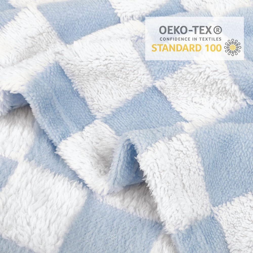 HOMRITAR blanket in a nursery setting with unisex styling