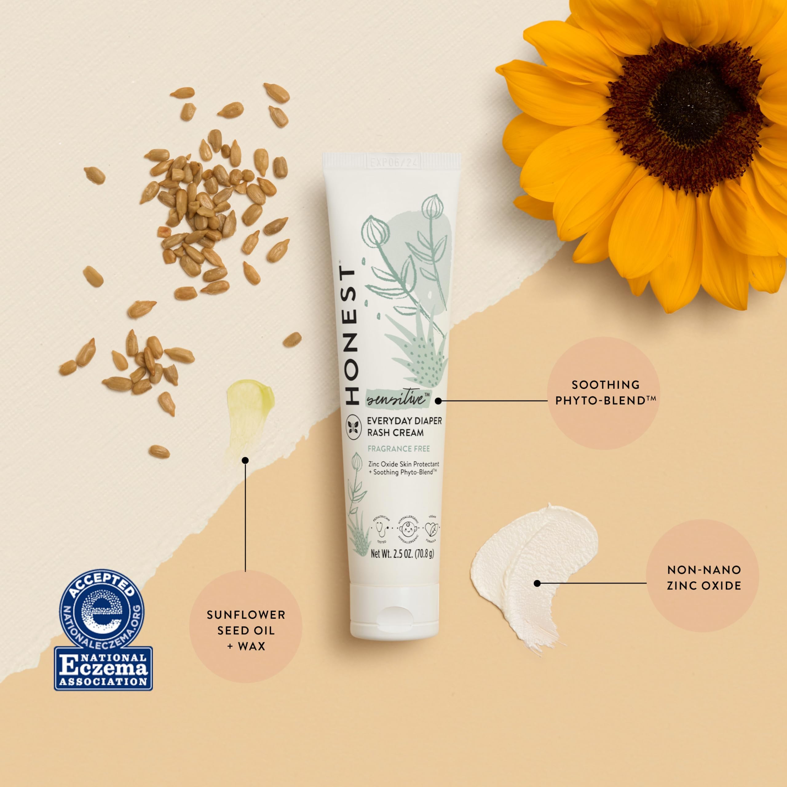 The Honest Company diaper rash cream tube close-up showing smooth application.