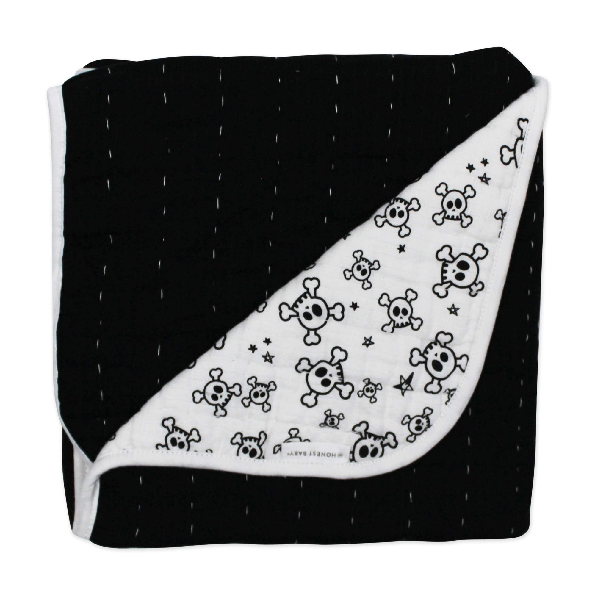 HonestBaby blanket reversible side with print showcases two nursery looks
