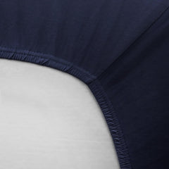 HonestBaby crib sheet elastic edge demonstrates easy on-and-off and secure fit