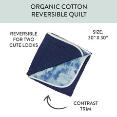 HonestBaby reversible blanket shows print on one side and solid on the other for versatile styling.