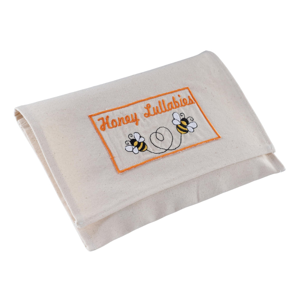 Honey Lullabies blanket in crib or stroller setup for on-the-go care.