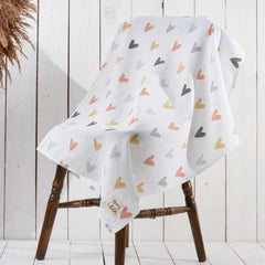 Honey Lullabies muslin blanket pastel hearts pattern adds gentle charm