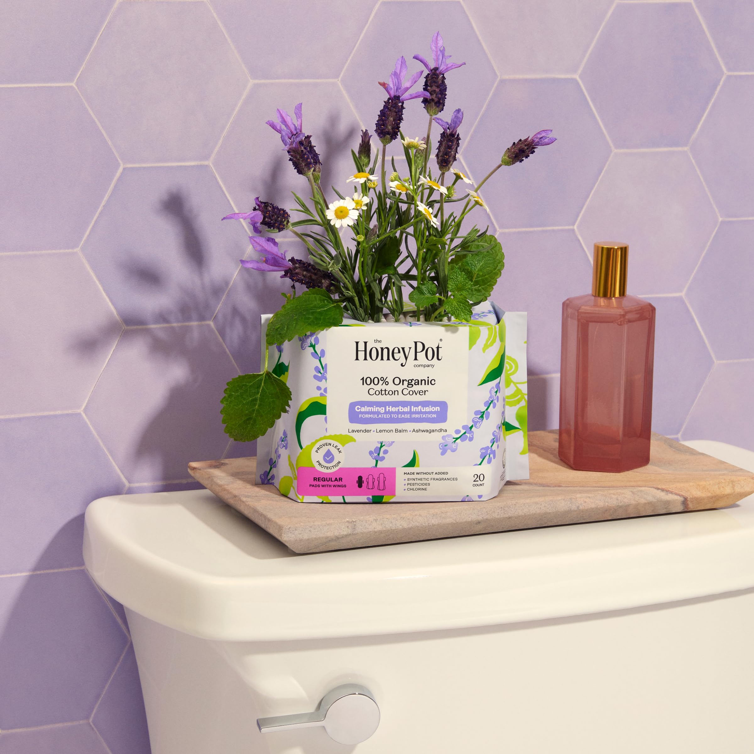The Honey Pot herbal infusion ingredients label highlighting natural essential oils.