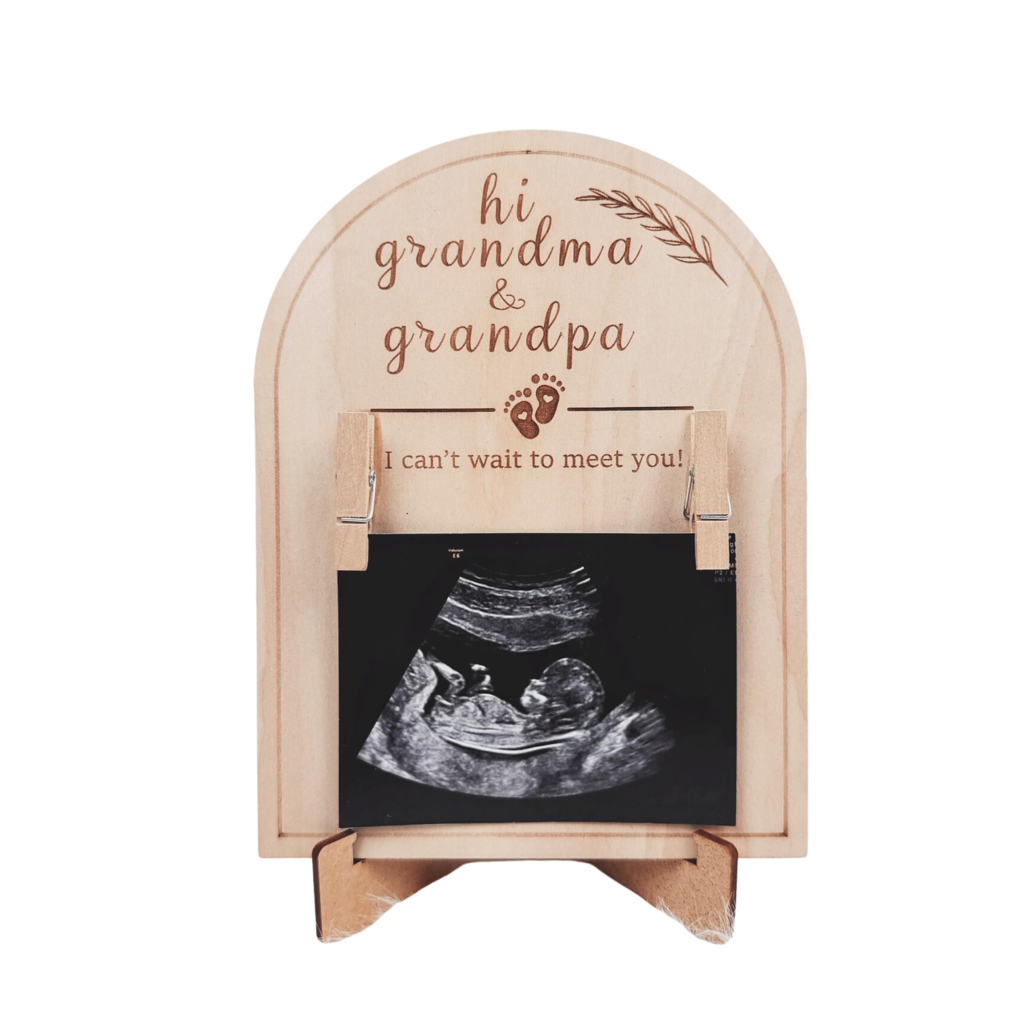 HONOCOOLS baby ultrasound frame displays a pregnancy reveal for grandparents on a desk.