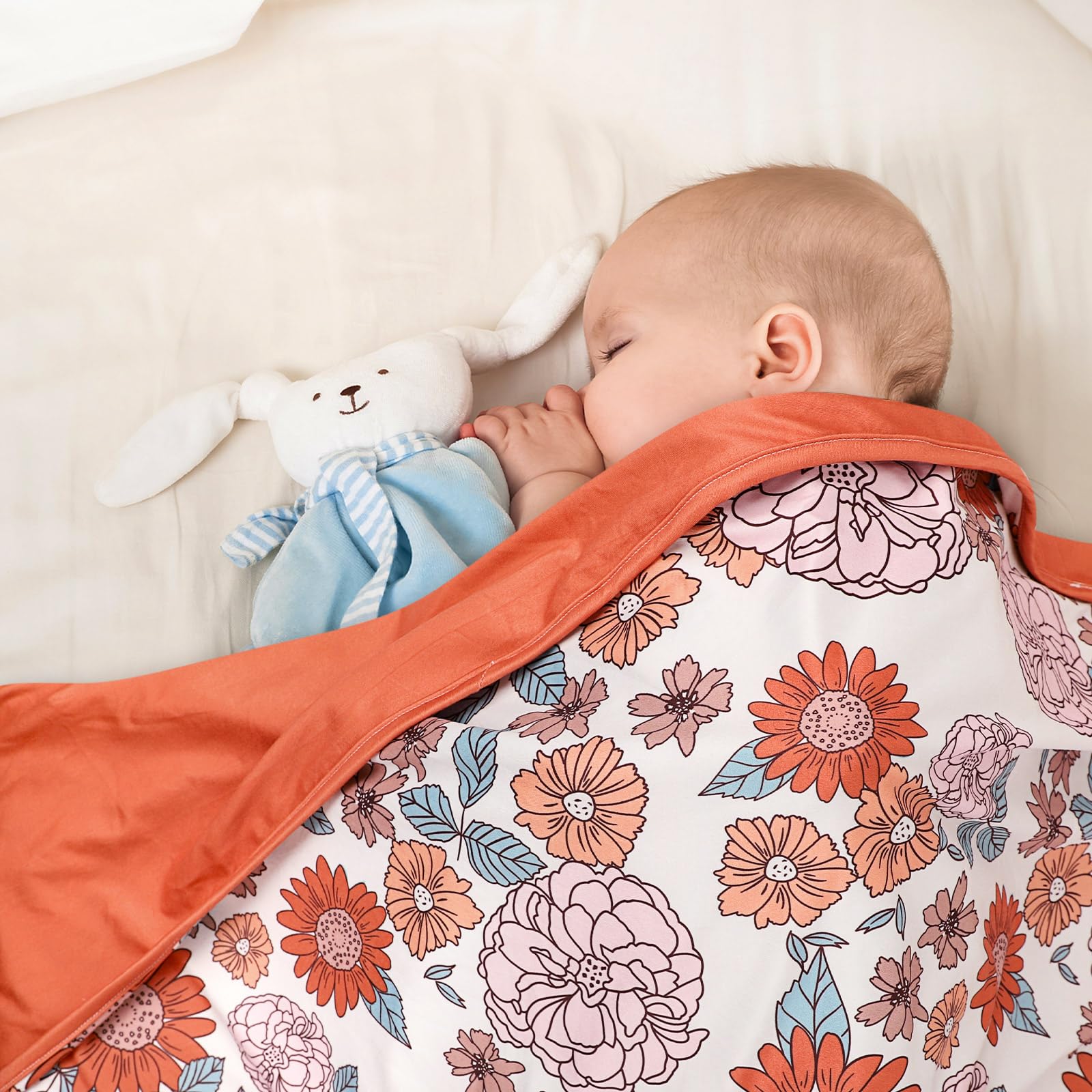 Hooyax blanket laid as a nursery play mat for floor time.