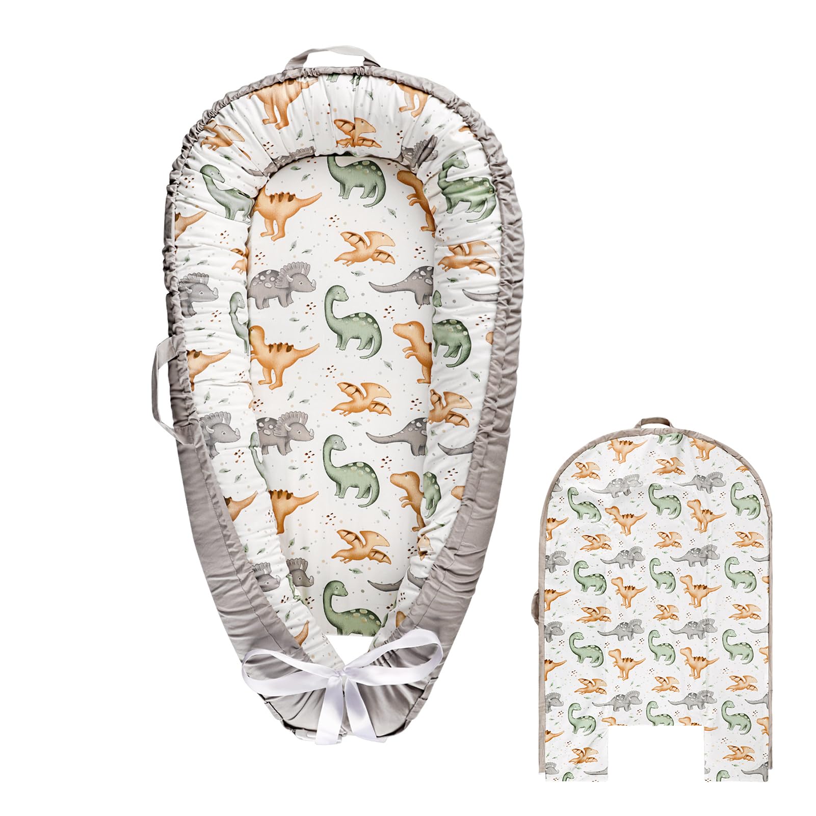 Hooyax baby lounger cover in dinosaur pattern on a cozy nest