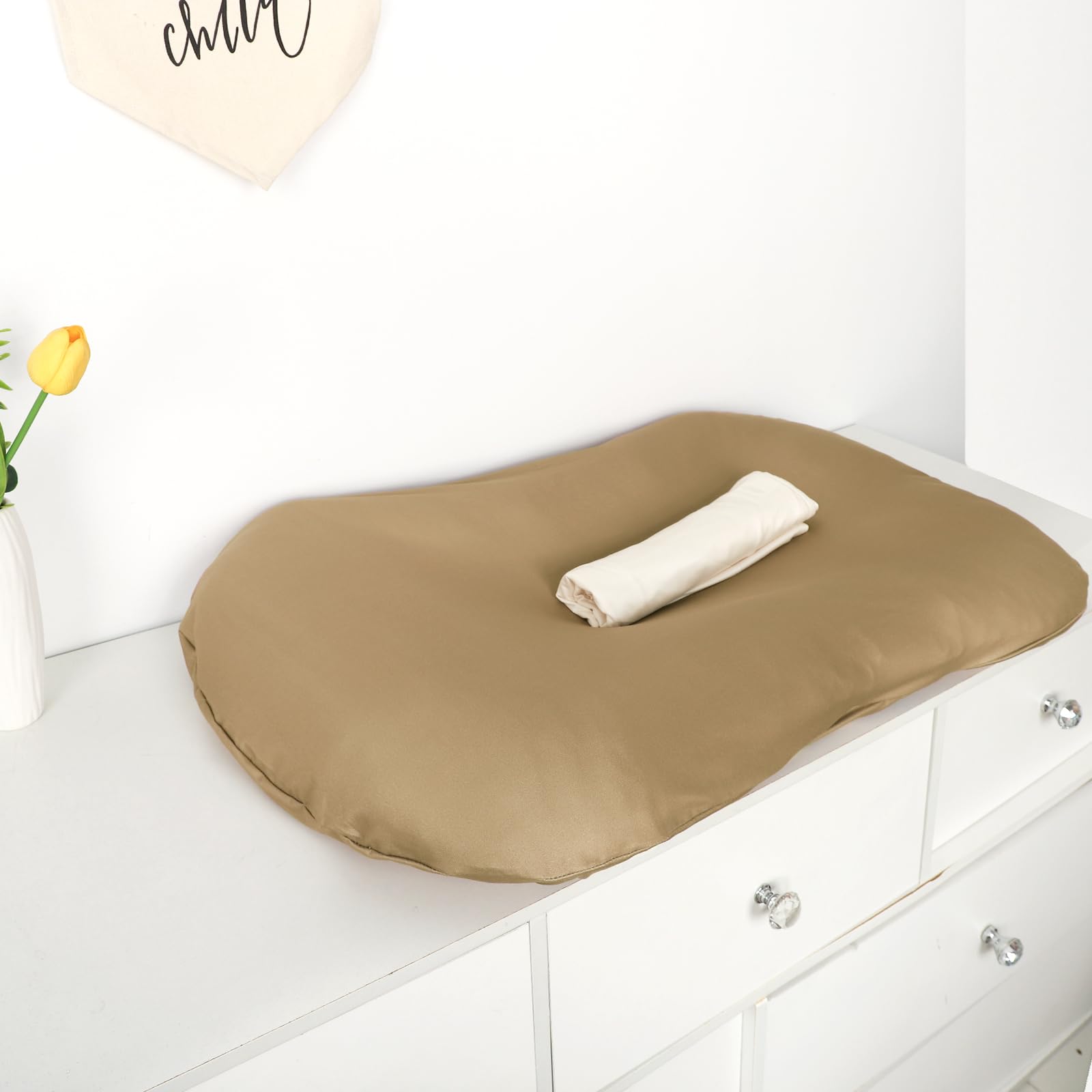 Hooyax lounger cover in use protecting cushions during feeding or play