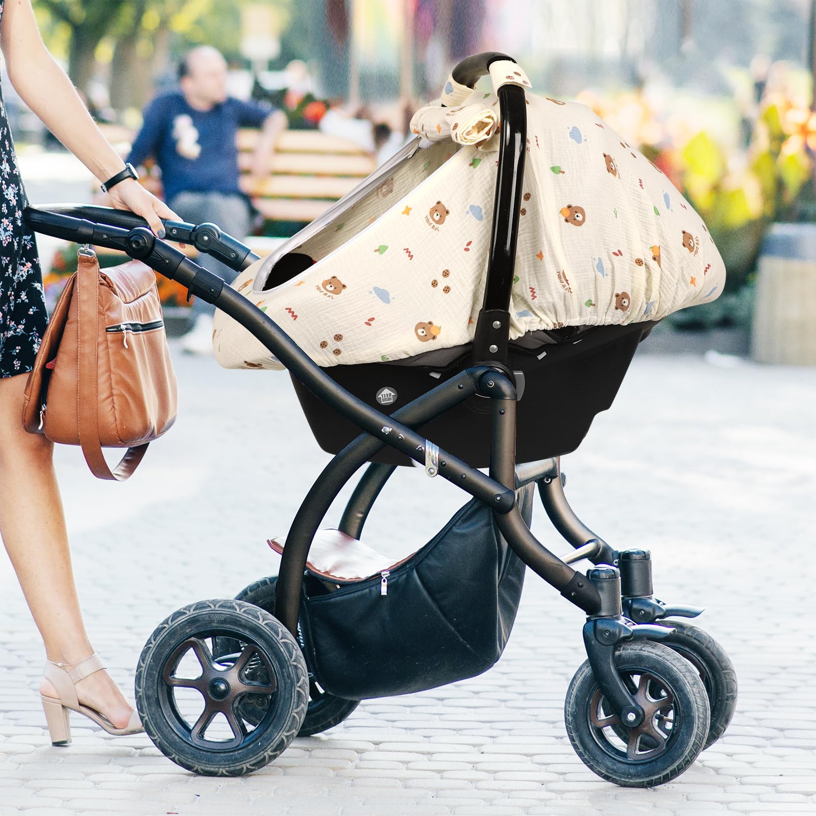 Hooyax bear muslin car seat cover keeps baby comfortable and breathable.