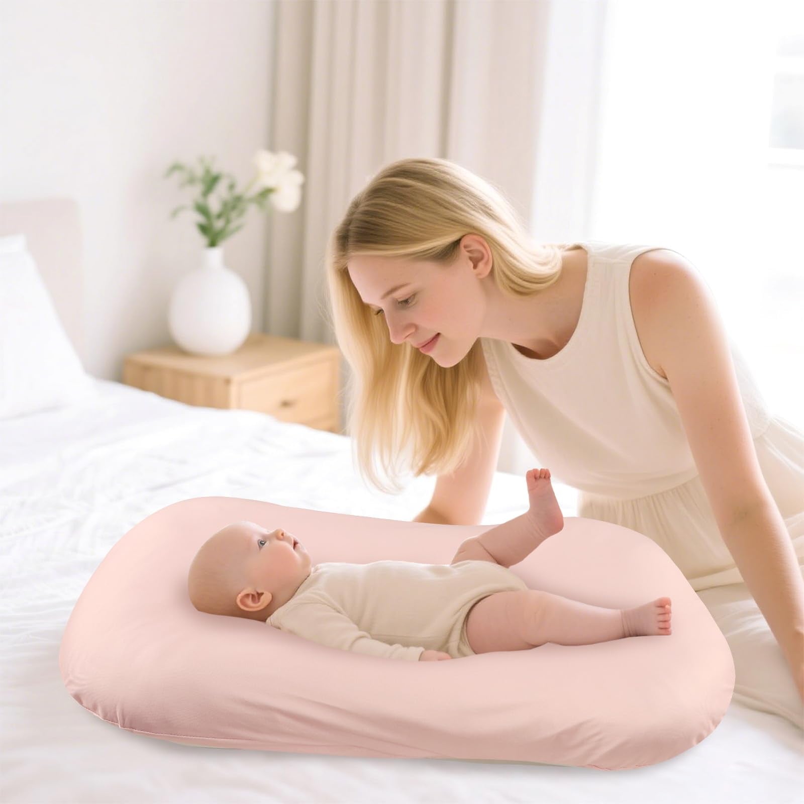 Hooyax cover on Snuggle Me-style lounger demonstrates easy envelope closure.