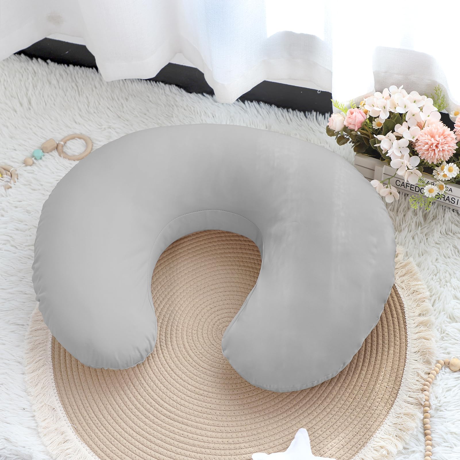 Hooyax grey nursing pillow cover in use during feeding.