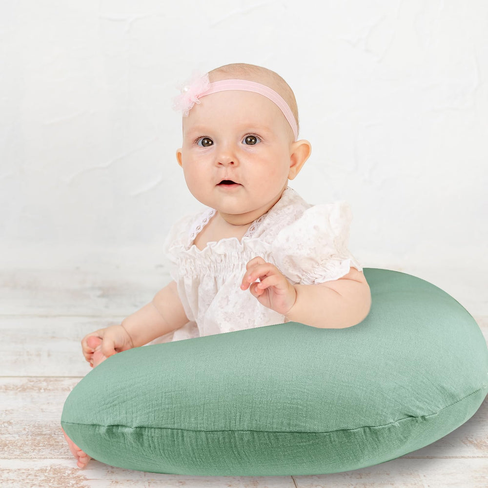Hooyax nursing pillow cover on a pillow shows durable, easy-care fabric.